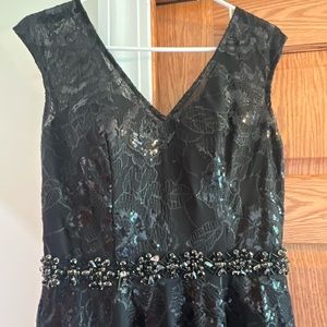 Worn one night MOB. Elegant. Hemmed to 5’4”. Small train. Slightly sparkly.